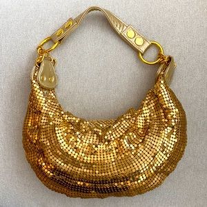 Gold metal miss sixty shoulder bag